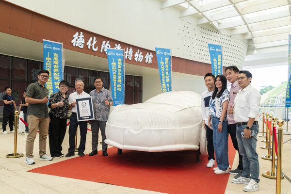 Selina Tang, CEO, with Luzerne staff celebrating the Guinness World Records™ title for the Largest Porcelain Car Sculpture (Supported), achieved in collaboration with the Dehua Ceramic Trade Association (China).