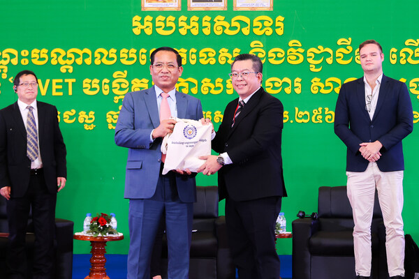 Chief Strategy Officer of Human Resource Development Corporation (HRD Corp), Dr. Rony Ambrose Gobilee (right) presented with a momento by H.E. Hing Sideth, Director General of Technical and Vocational Education and Training Ministry of Labour and Vocational Training (MLVT), The Kingdom of Cambodia during the 8th National TVET Day, Phnom Penh, Cambodia.