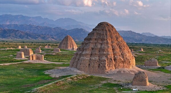A drone photo taken on July 10, 2025 shows two Xixia imperial tombs in northwest China's Ningxia Hui Autonomous Region. (By Wang Peng)