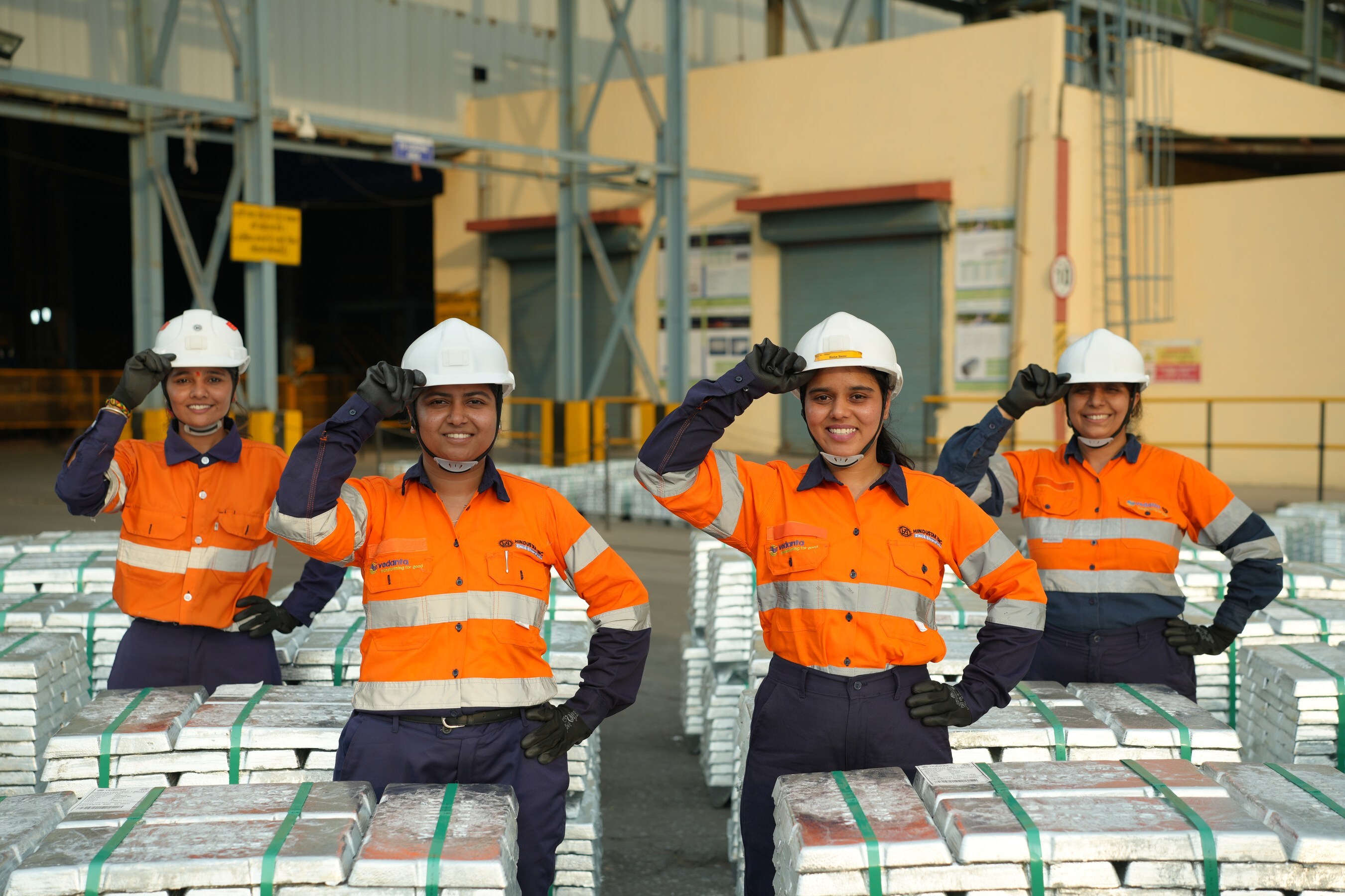 Hindustan Zinc employees with ingots Hindustan Zinc employees with ingots