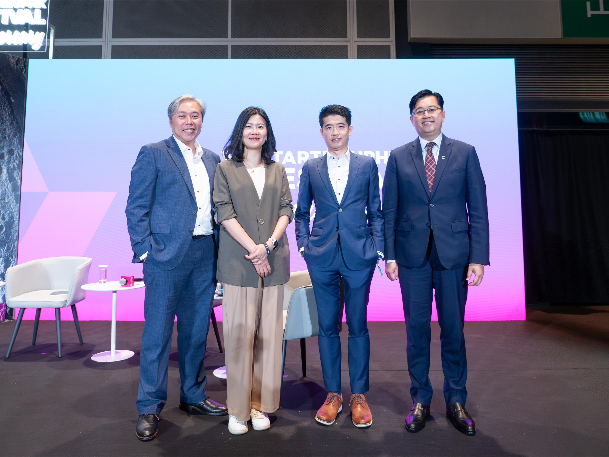 Dennis Wong, Executive Director, Head of Technology of Hang Seng Indexes Company (first left) discusses how AI solve industry pain points and shares successful commercial use case during a panel at the Hong Kong FinTech Week 2025, moderated by Eric Chan, Chief Public Mission Officer of Cyberport (first right).