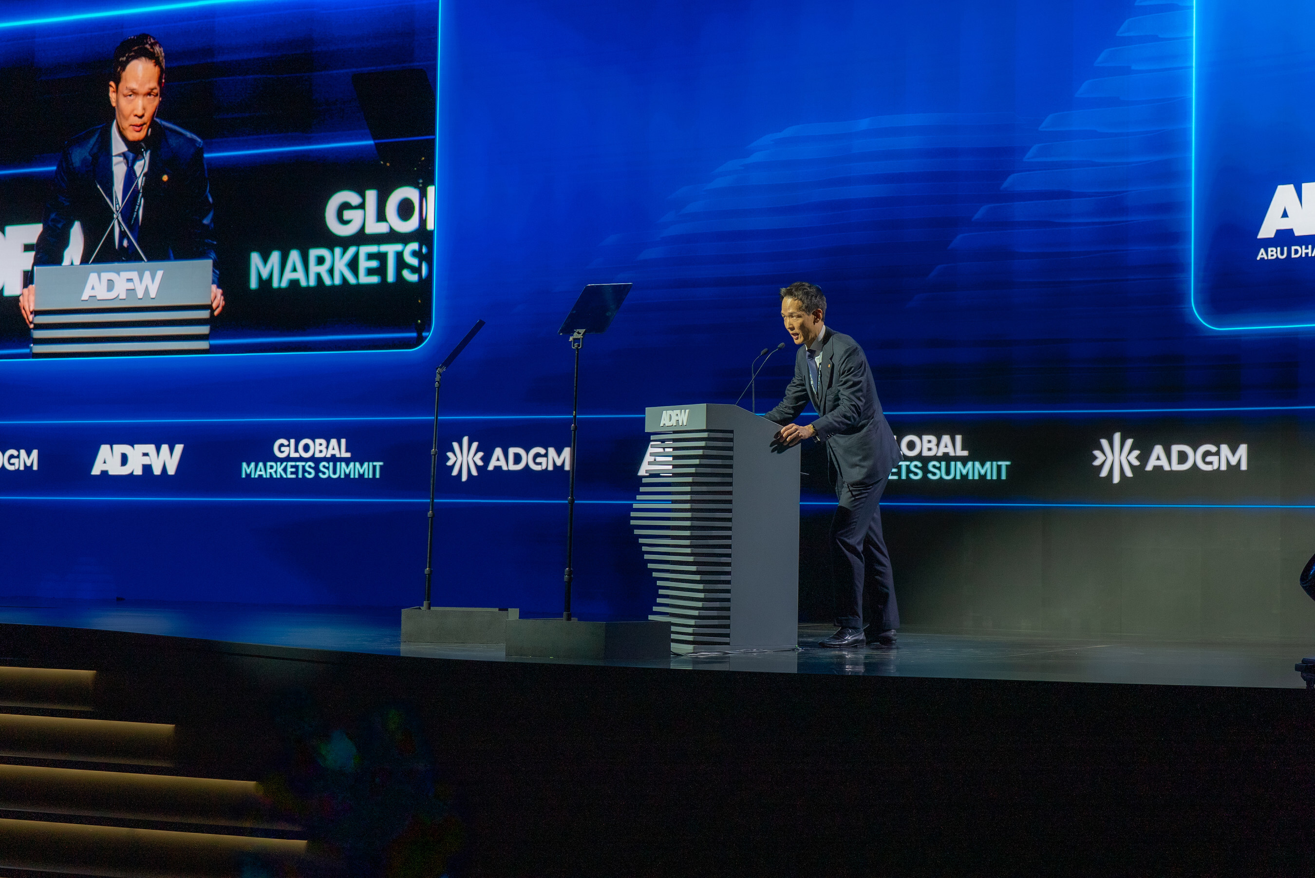 Dong-Won Kim, Chief Global Officer (CGO) of Hanwha Life, delivers the opening address at the Global Markets Summit during ADFW 2025 on December 8.