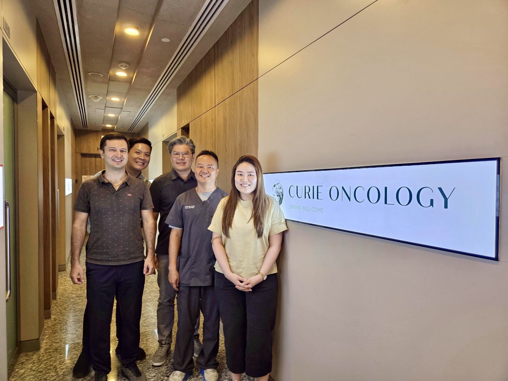 From left to right: Ruslan Enikeev, CTO and cofounder of Oncoshot; Adrian Chan, integration project manager at Oncoshot; Chua Chee Yong, CCO of Oncoshot; Dr Toh Chee Keong, medical oncologist at Curie Oncology; and Jing Yee Ooi, trial research coordinator at Curie Oncology.